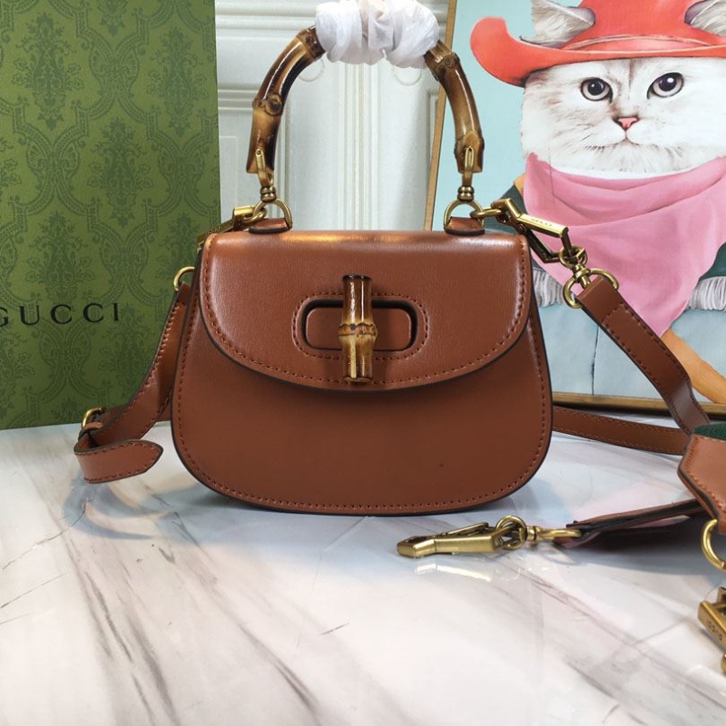 G*u*i top handle bags